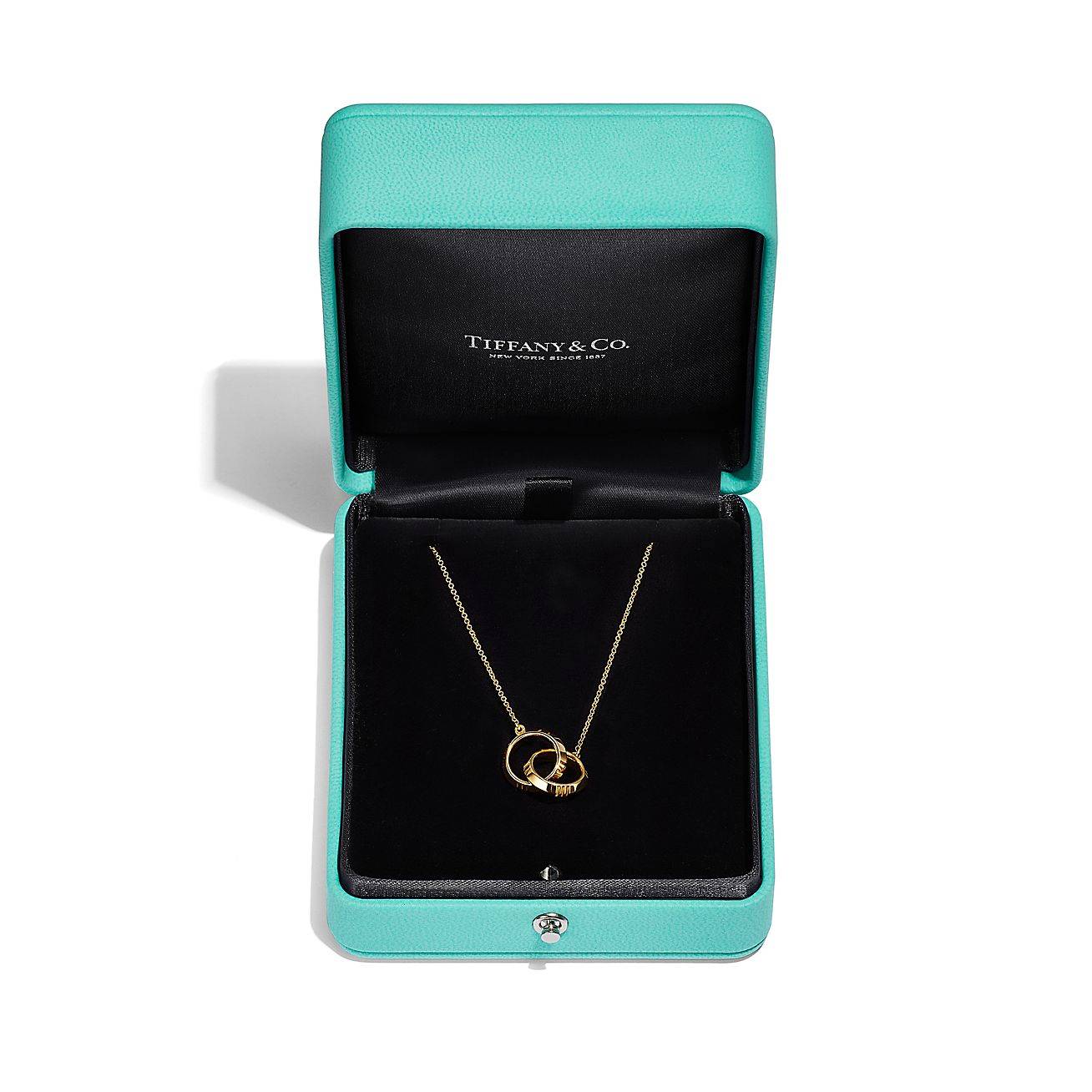 TIFFANY&CO.ATLAS® X CLOSED INTERLOCKING PENDANT IN YELLOW GOLD 67789202